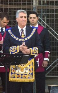 Greg Levenston at a ceremony